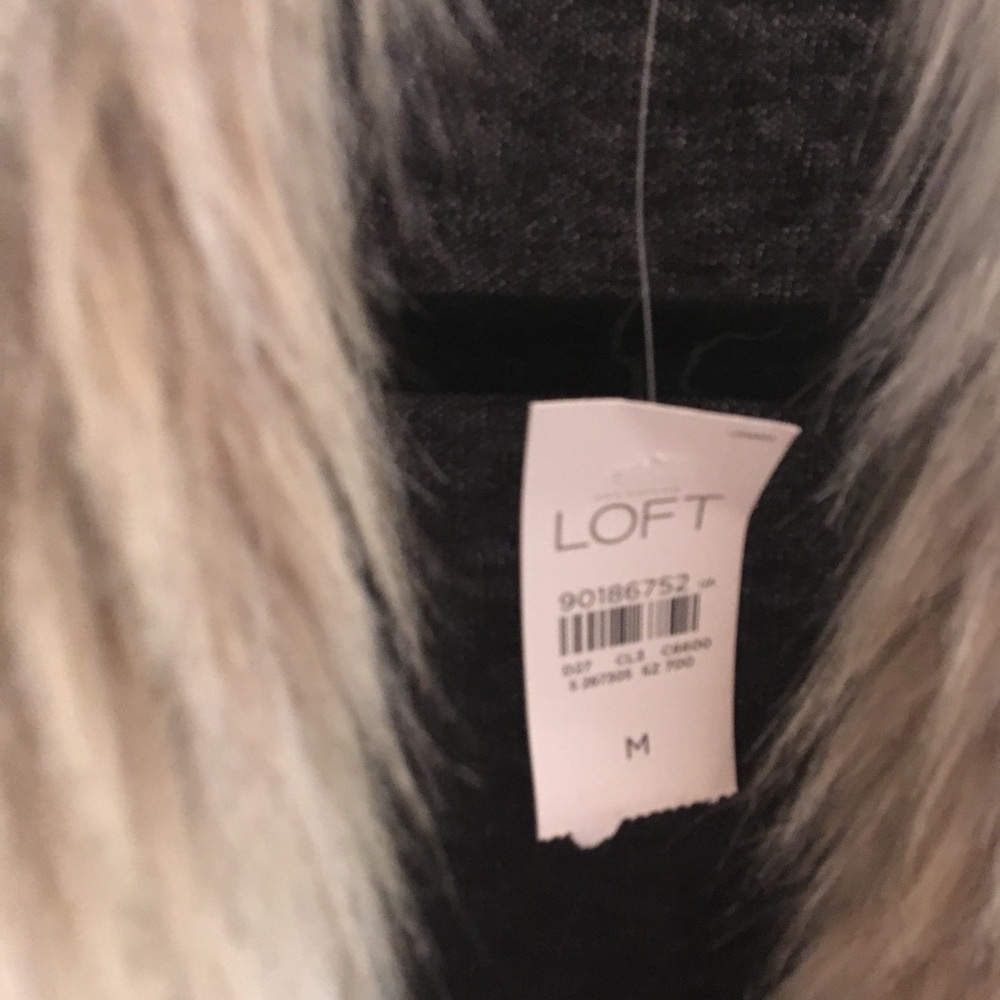 fake fur , loft, never been worn. No smoking